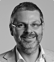Black and white headshot of Dan Cook